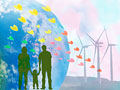 手をつなぐ家族と風力発電のイメージ