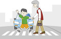 横断歩道を渡る男の子とシニア男性
