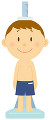 身長を測る男の子