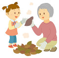 孫と焼き芋を作る老人女性