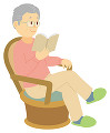 チェアに座って本を読む老人男性