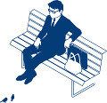公園のベンチに座るビジネスマン
