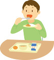 給食を食べる小学生男子