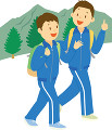 林間学校で山登りをする中学生男子