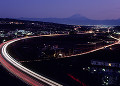 夜景の中央自動車道と富士山